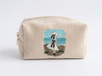 Trousse de toilette brodée femme à la plage